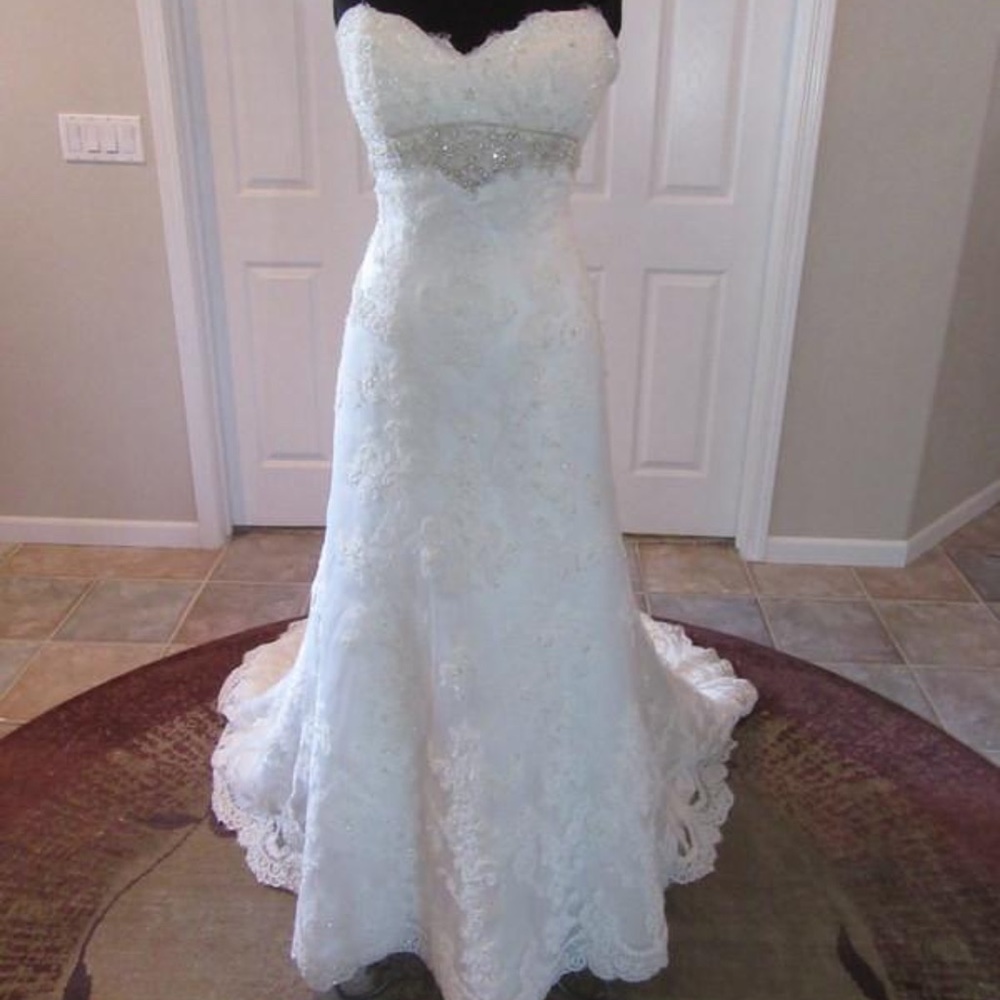 Casa Blanca Size 14 never been altered. Dress was discontinued.